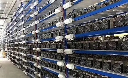 A large-scale mining farm with rows of ASIC miners, showcasing the scale and infrastructure involved in modern cryptocurrency mining.